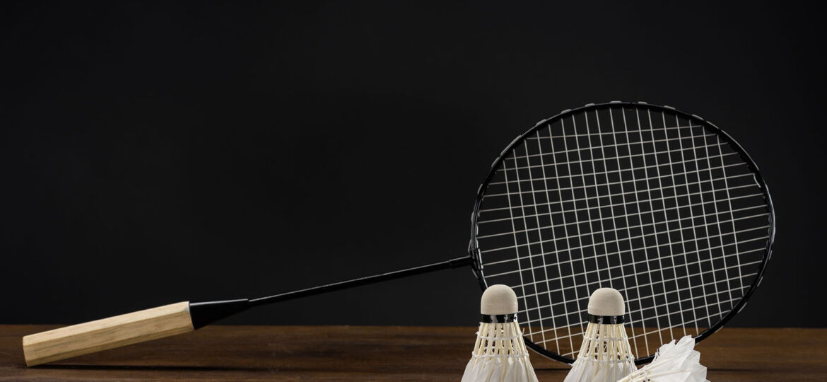 closeup-shot-of-badminton-racket-and-three-shuttle