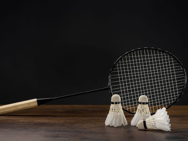 closeup-shot-of-badminton-racket-and-three-shuttle